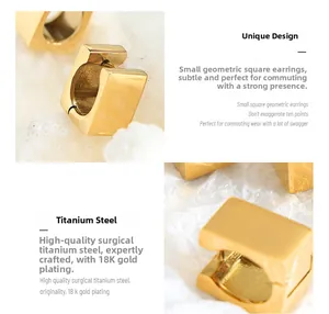 Detailed close-up of 18K gold plated surgical titanium steel geometric cube earrings