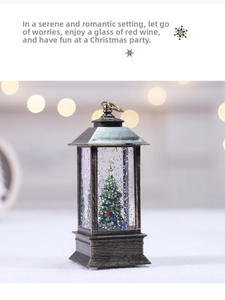 Macro detail of Christmas water globe lantern with festive tree and bronze finish