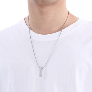 Mens silver stainless steel rectangular bar pendant necklace on white tshirt