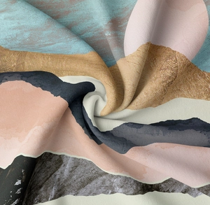 Macro shot of mountain print tapestry showing premium twill fabric texture and draped folds