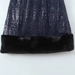Sequin dress in navy blue with elegant black faux fur hem and sparkling texture