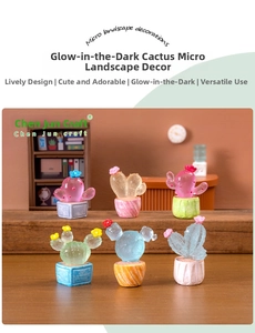 Macro detail of six mini resin cactus figurines with glow-in-the-dark feature and pots