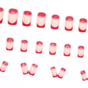 Faux ongles carrés roses avec pointes French rouges et dégradé de paillettes