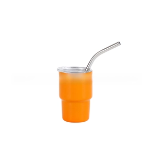 Detail of 3oz orange tumbler with stainless steel straw and clear lid for car cup holders
