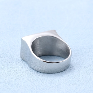Polished silver stainless steel biker ring featuring a minimalist MC logo engraved on band