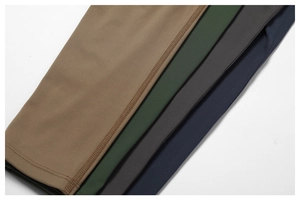 Detail of multi-color yoga jumpsuits showing premium flatlock stitching and high-elastic fabric