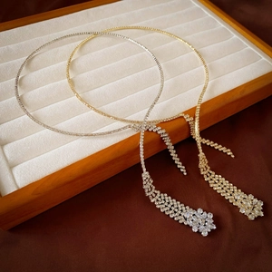 Luxurious tassel fringe necklaces in gold and silver finish with sparkling zircon stones