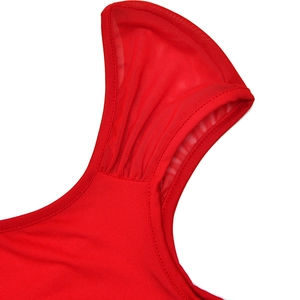 Detail of red square neck top featuring breathable mesh shoulder straps and precise stitching
