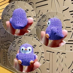 Cute purple penguin resin keychain with bubble texture showing front side and back views