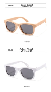 Detail view of desert tan and shark white silicone sunglasses for toddlers