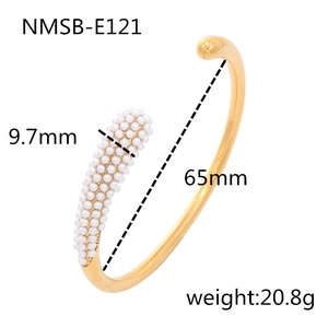 Gold plated stainless steel open bangle featuring elegant white pearls and a luxury design