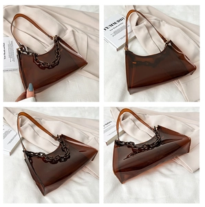 Detailed views of brown transparent jelly bag with chunky chain and leather strap