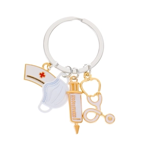 Nurse themed gold enamel keychain with syringe stethoscope and medical cross charms