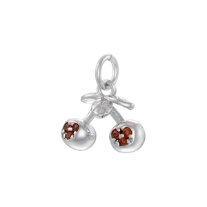 Detailed close-up of a creative cherry pendant with gold plating and red crystal inlay