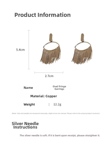 Detail view of oval tassel earrings in antique gold finish showing 5.4cm size parameters