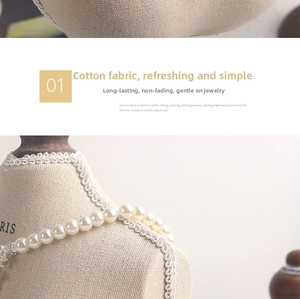 Detailed close-up of linen mannequin bust with woven lace edge for necklace display