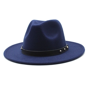 Detail of dark blue wool fedora hat featuring black leather band and silver metal rivets