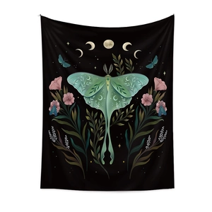 Bohemian black tapestry featuring a mint green luna moth and golden moon phases