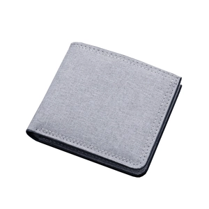 Slim light gray canvas bifold wallet for men with durable fabric texture and fine stitching