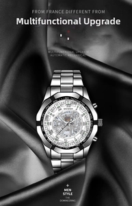 Close-up of skeleton automatic watch movement with tachymeter bezel on black silk