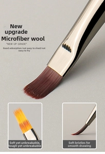 Macro view of ultra-fine fiber bristles and metal ferrule on a professional nail art brush