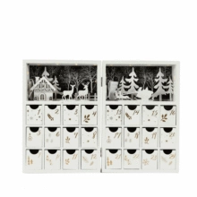 Close-up of wooden advent calendar with 24 drawers and lighted winter forest scene
