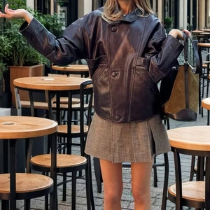 Veste vintage en cuir marron foncé coupe ample avec col à revers et grandes poches