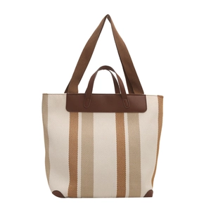 Large striped canvas tote bag with brown leather handles for women's daily commute