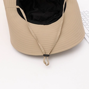 Detail of khaki sun hat featuring breathable mesh lining and adjustable windproof cord