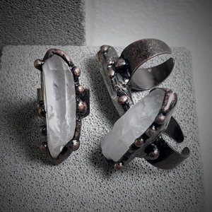 Vintage handmade bronze adjustable ring featuring a natural raw white crystal stone