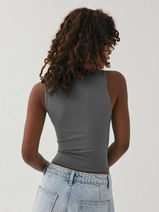 Rear view of dark grey tight-fitting sleeveless Y2K crop tank top with knitted texture