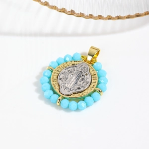 Two-tone St. Benedict medal pendant with gold plating and blue beaded decorative ring