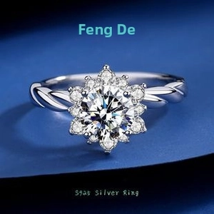 Detail of S925 sterling silver ring with snowflake moissanite and twisted band design