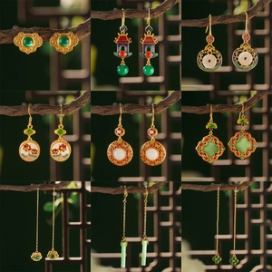 Detailed grid of neo-Chinese vintage gold earrings with jade imitation and enamel art