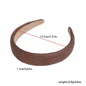 Detailed view of brown woven headband with 13.5cm diameter and 1.7cm width measurements
