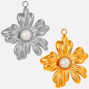 Detailed view of floral 304 stainless steel pendants with natural pearls in gold and silver