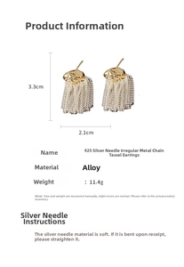Detail view of 925 silver needle tassel earrings with gold-plated irregular metal design