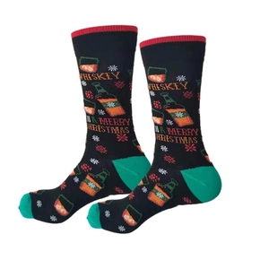 Detail of Christmas socks with whiskey bottle patterns and Merry Christmas text