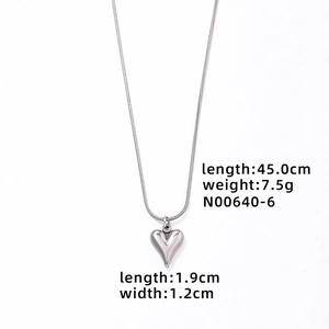 Detail of silver heart pendant on snake chain with dimensions 1.9cm and 45cm length