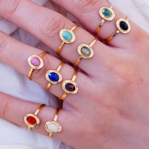 French style stainless steel open rings with assorted natural stones on female hand
