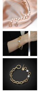Detailed close-up of gold-plated toggle clasp pearl bracelet with K18 engraving detail