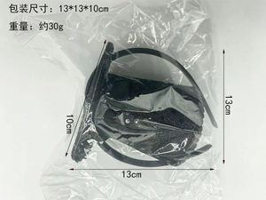 Detail view of black glitter Halloween witch hat headband in protective plastic packaging