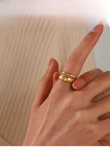 Macro view of minimalist dual-layer 18K gold-plated stainless steel stackable rings