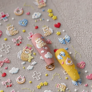 3D embossed nail stickers featuring cute bear, cloud, and heart patterns on fake nails