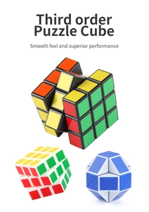 Detail of smooth 3x3 speed cubes in black and white bases with a blue snake cube puzzle