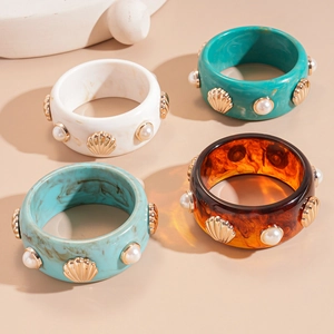 Retro resin bangle set with gold shells and pearls in marble, blue, amber, and mint