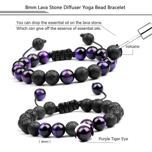 Detail of 8mm lava rock and purple tiger eye stone diffuser bracelet with adjustable cord