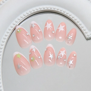 Star pattern almond press-on nails with French tips and sparkling rhinestones for women
