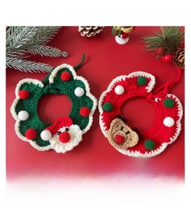 Detail of handmade crochet pet collars featuring Santa Claus and Reindeer festive designs