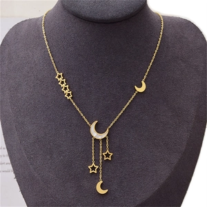 Star and moon gold necklace with shell inlay and hollow star tassels on neck model